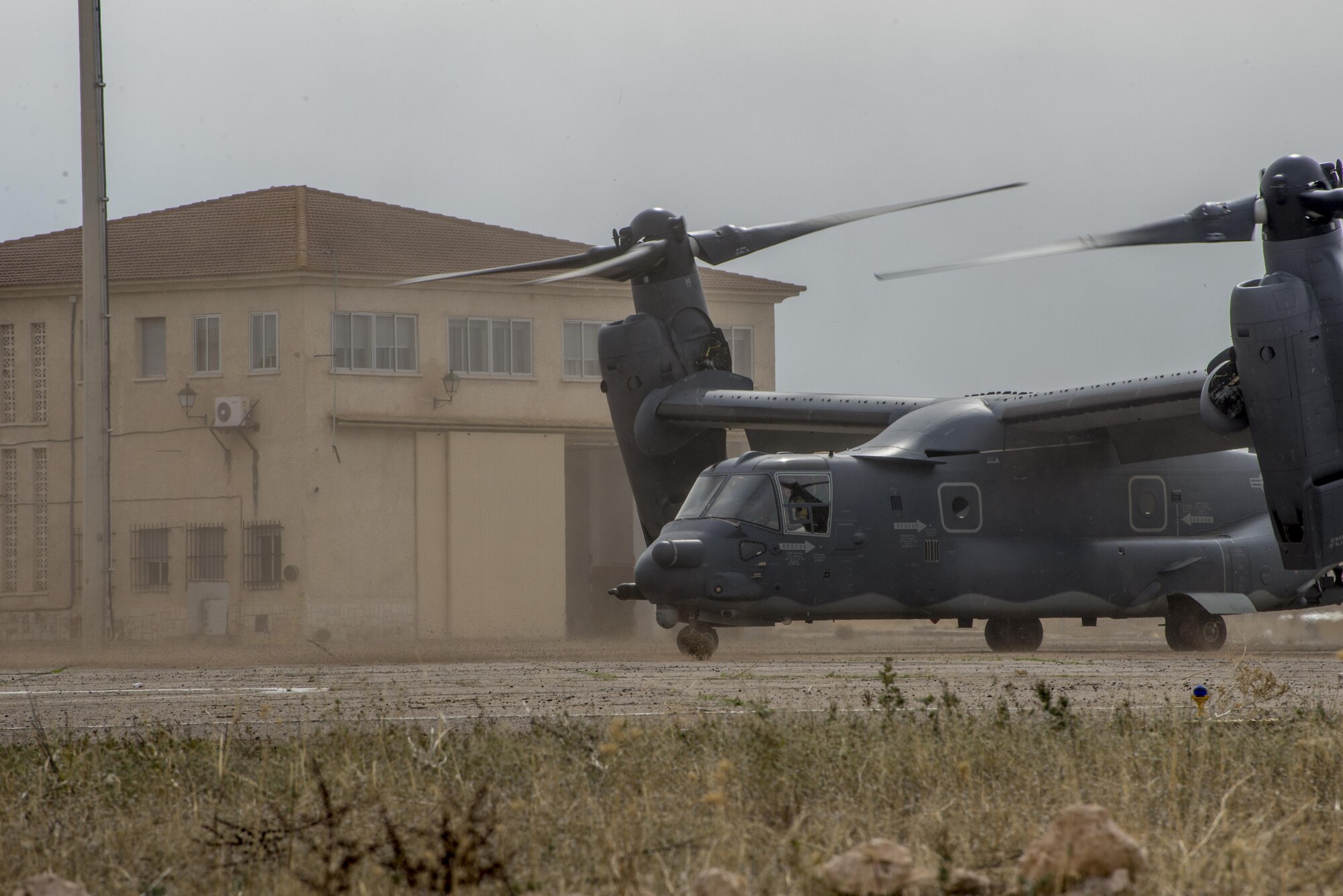 A CV-22 O Osprey from the 352d Special Operations Wing taxis after a long day of training in Almagro, Spain, Oct 24, 2015. Two of the U.S. Air Force’s tilt-rotor aircraft participated in a multi-national training event where ground and air forces trained together in personnel off-loading and on-loading procedures during TRIDENT JUNCTURE 15. (U.S. Air Force photo by 1st Lt. Chris Sullivan/Released)