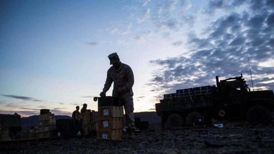 A Marine with Alpha Company, 1st Battalion, 8th Marine Regiment prepares the ammunition for the live-fire range during Integrated Training Exercise 1-16 aboard Marine Air Ground Combat Center, Twentynine Palms, Calif., Oct. 26, 2015. During ITX, Marines demonstrate core infantry mission essential tasks while conducting offensive and defensive stability operations.