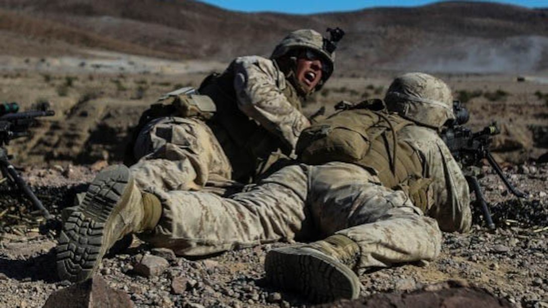 Marines with Alpha Company, 1st Battalion, 8th Marine Regiment fire downrange with an M240B Machinegun during Integrated Training Exercise 1-16 aboard Marine Air Ground Combat Center, Twentynine Palms, Calif., Oct. 26, 2015. During ITX, Marines demonstrate core infantry mission essential tasks while conducting offensive and defensive stability operations. 