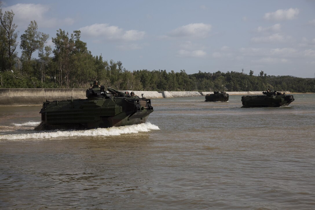 U.S. Marines with 1st Battalion, 2nd Marine Regiment, currently assigned to 4th Marine Regiment, 3rd Marine Division, III Marine Expeditionary Force, on unit deployment program, participate in a simulated amphibious assault during Blue Chromite 16 at Central Training Area, Okinawa, Japan, Oct. 29, 2015. Blue Chromite 16 demonstrates the Navy/Marine Corps’ responsive amphibious expeditionary capabilities. (U.S. Marine Corps photo by LCpl. Makenzie Fallon/Released) 