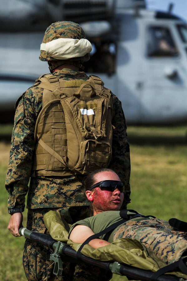Lance Cpl. Kelcey E. Kelly is carried on board a CH-53E Super Stallion after acting as a simulated improvised explosive device victim during Blue Chromite 2016, at Central Training Area, Okinawa, Japan, Oct. 29, 2015. The shock trauma platoon conducted the emergency aid after the mass casualty scenario occurred. Blue Chromite is a large-scale amphibious exercise that draws primarily from III Marine Expeditionary Force’s training resources on Okinawa. The location of the training allows participating units to maintain a forward-deployed posture and eliminates the cost of traveling to train. Kelly, from Bellingham, Massachusetts, is an embarkation specialist with 3rd Medical Battalion, 3rd Marine Logistics Group, III MEF.