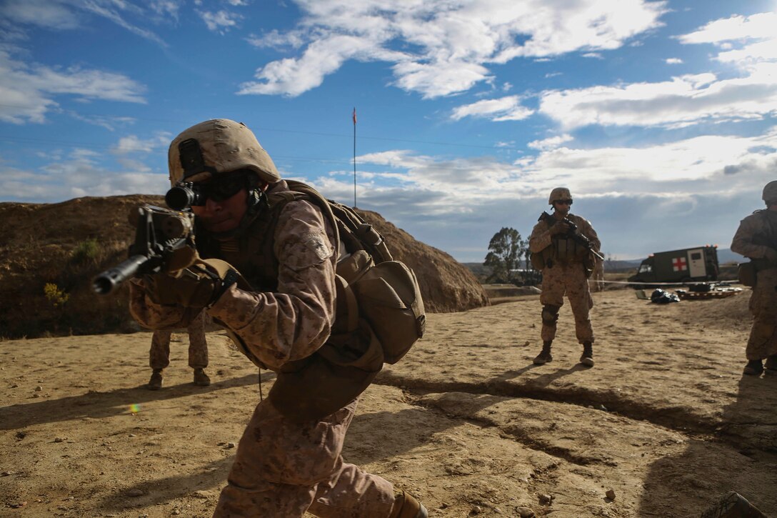 Lance Cpl. Arturo Campos, assistant fire team leader for Delta Co., 4th Light Armored Reconnaissance Battalion, 4th Marine Division, run through dry fire drills during exercise Trident Juncture 2015 in Almeria, Spain, Oct. 27, 2015. These drills allow Reserve Marines to train in realistic environments and maintain a high state of readiness. More than 36,000 troops from more than 30 nations are participating in the exercise which is the largest NATO has conducted in the past 10 years.