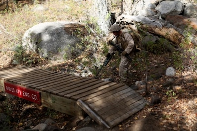 Cpl. Ben Hernandez, water purification specialist, Combat Logistics Battalion 11, 1st Marine Logistics Group, checks for potential improvised explosive devices or threats conducted by members of CLB-11’s engineer platoon during Mountain Exercise 6-15 at Marine Corps Mountain Warfare Training Center, Bridgeport, Calif., Oct. 25, 2015. Engineer Platoon conducted two consecutive days of security patrols along a mountain trail to provide route reconnaissance, deter enemy forces and remove obstacles that would restrict friendly and civilian movement.
