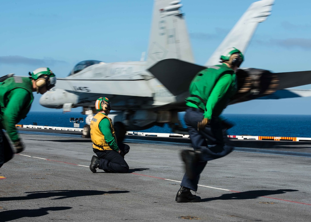 An F/A-18C Hornet assigned to the Sharpshooters of Marine Fighter Attack Training Squadron 101 takes off from the flight deck of the USS John C. Stennis in the Pacific Ocean, Oct. 26, 2015. U.S. Navy photo by Petty Officer 3rd Class Andre T. Richard