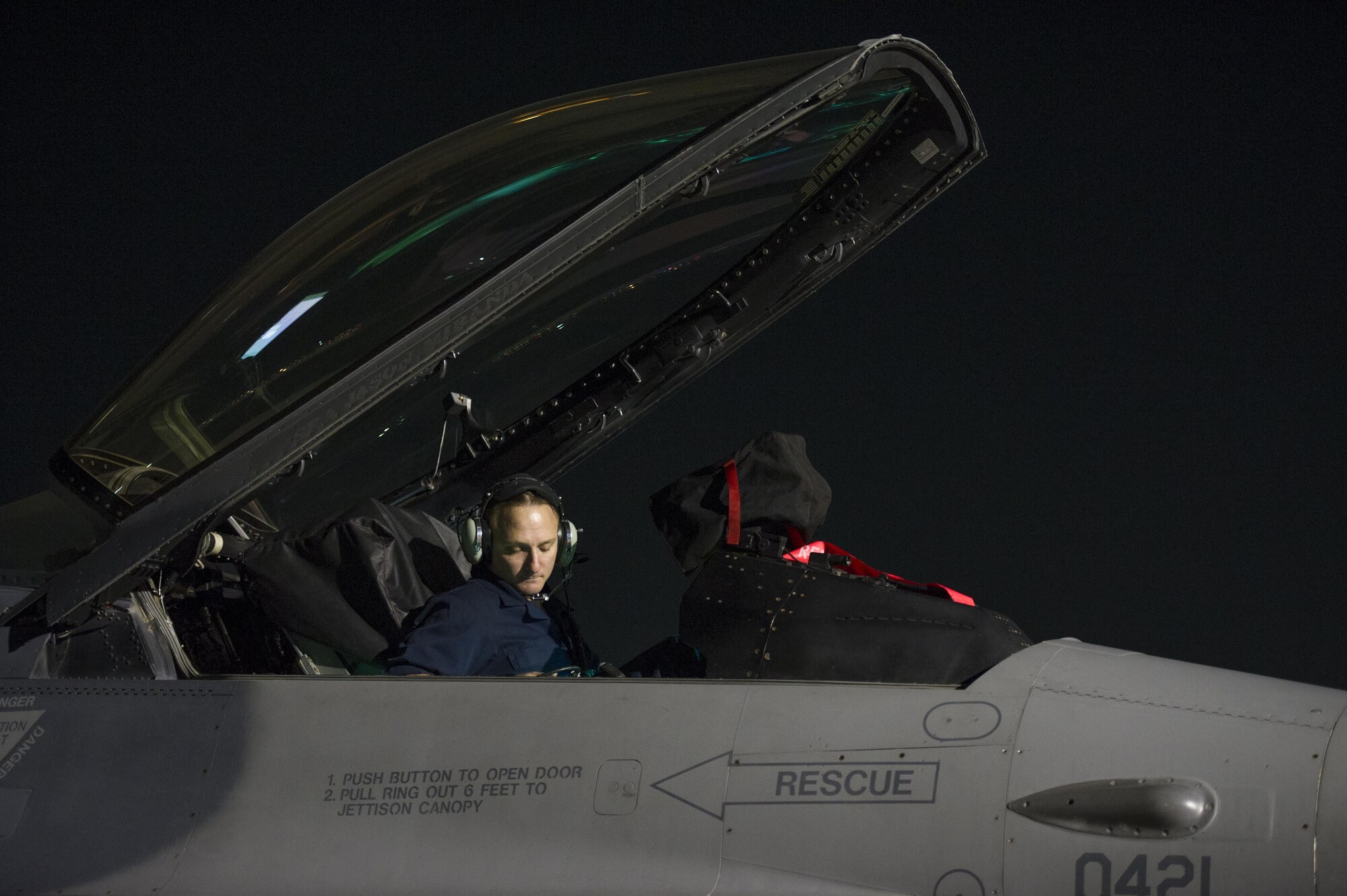 Staff Sgt. Christopher Bindernagel, 455th Expeditionary Aircraft Maintenance Squadron F-16 avionics craftsman, deployed from Hill Air Force Base, Utah, performs maintenance on an F-16 Fighting Falcon at Bagram Airfield, Afghanistan, Oct. 28, 2015. The 421st Fighter Squadron from Hill AFB will relieve the 555th Expeditionary Fighter Squadron from Aviano Air Base, Italy this month. (U.S. Air Force photo by Tech. Sgt. Robert Cloys/Released)