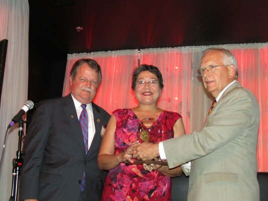 ERDC-EL Research Biologist Dr. Kathleen Perales received the American Academy for Park and Recreation Administration’s (AAPRA) highest recognition in the United States for outstanding contributions to the promotion and development of recreation, parks and conservation, the Cornelius Amory Pugsley Medal, at an award ceremony Sept. 17 in Las Vegas, Nevada.  Dr. Brett Wright, left, interim dean, College of Health, Education and Human Development; Clemson University, and Ron Dodd, Pugsley committee chair, (AAPRA) made the presentation