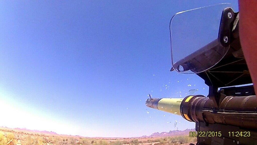 A live Stinger-RMP Missile launches through the IR window as Lance Corporal Adam A. Panfil engages an aerial target as the culminating event for Low Altitude Air Defense Basic Gunners Course 3-15.  Photo was taken via GoPro mounted to the Stinger Missile.