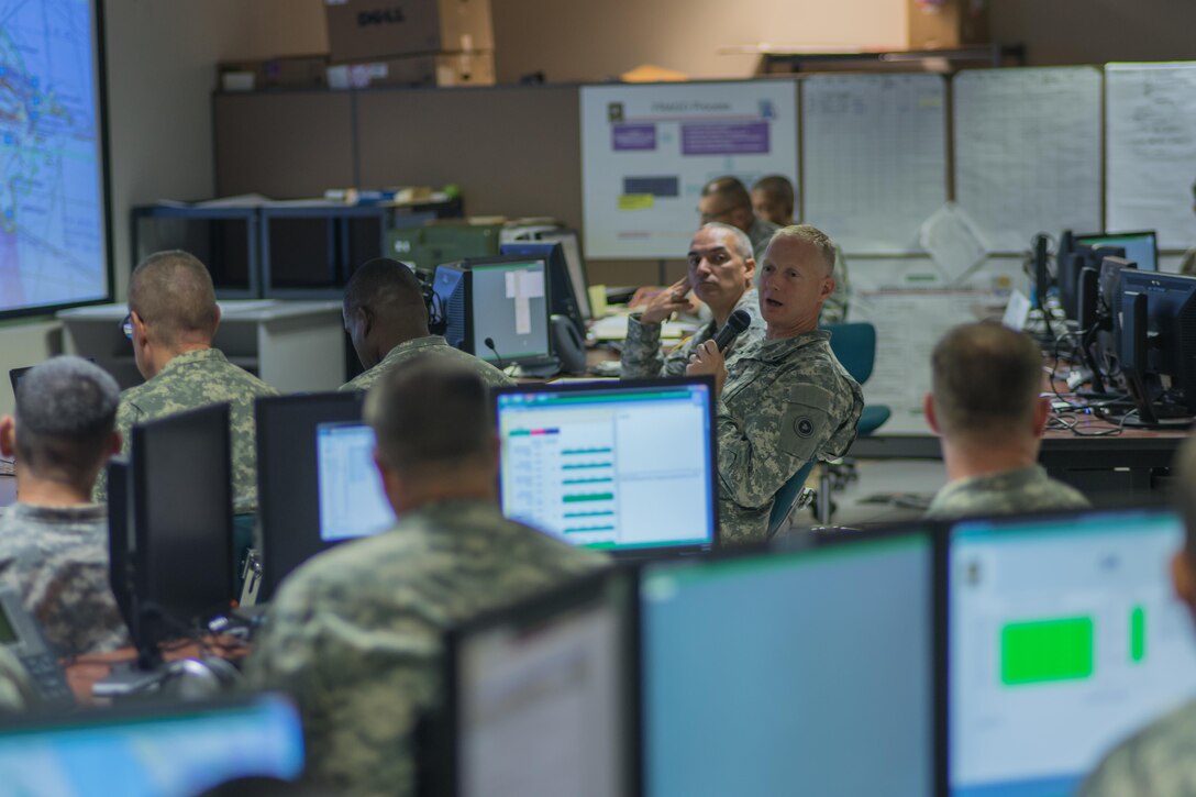 Brig. Gen. David Elwell, Commanding General, 311th Sustainment Command (Expeditionary), speaks to his staff during a Battle Update Brief during the Command Post Exercise – Functional at Camp Parks, Calif., Sept. 20. The CPX-F uses a closed computer network, to simulate the operation of a command post within a simulated theater of operation, complete with inputs and feedback from notional higher, lower, adjacent, and adversary units.