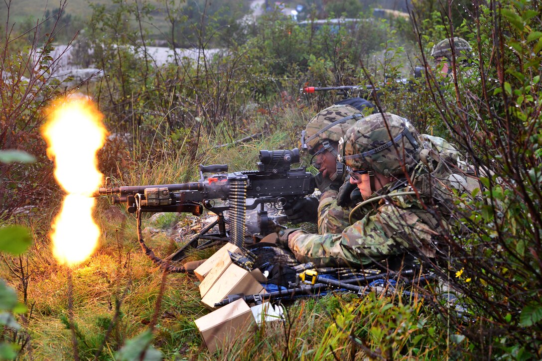 U.S. paratroopers engage targets with M240 machine guns during  live-fire training as part of Rock Proof V at Bac Range in Postojna, Slovenia, Oct. 19, 2015. The exercise aims to build relationships between allies and provide realistic training environments for all parties involved. The paratroopers are assigned to 2nd Battalion, 503rd Infantry Regiment, 173rd Airborne Brigade. U.S. Army photo by Paolo Bovo