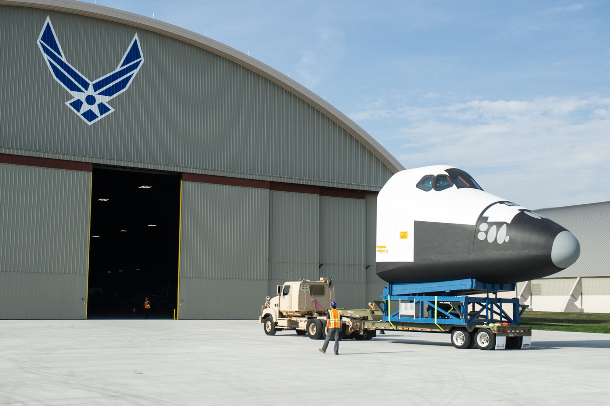DAYTON, Ohio -- Restoration staff move the Space Shuttle Exhibit(CCT) into the new fourth building at the National Museum of the U.S. Air Force on Oct. 22, 2015. (U.S. Air Force photo)