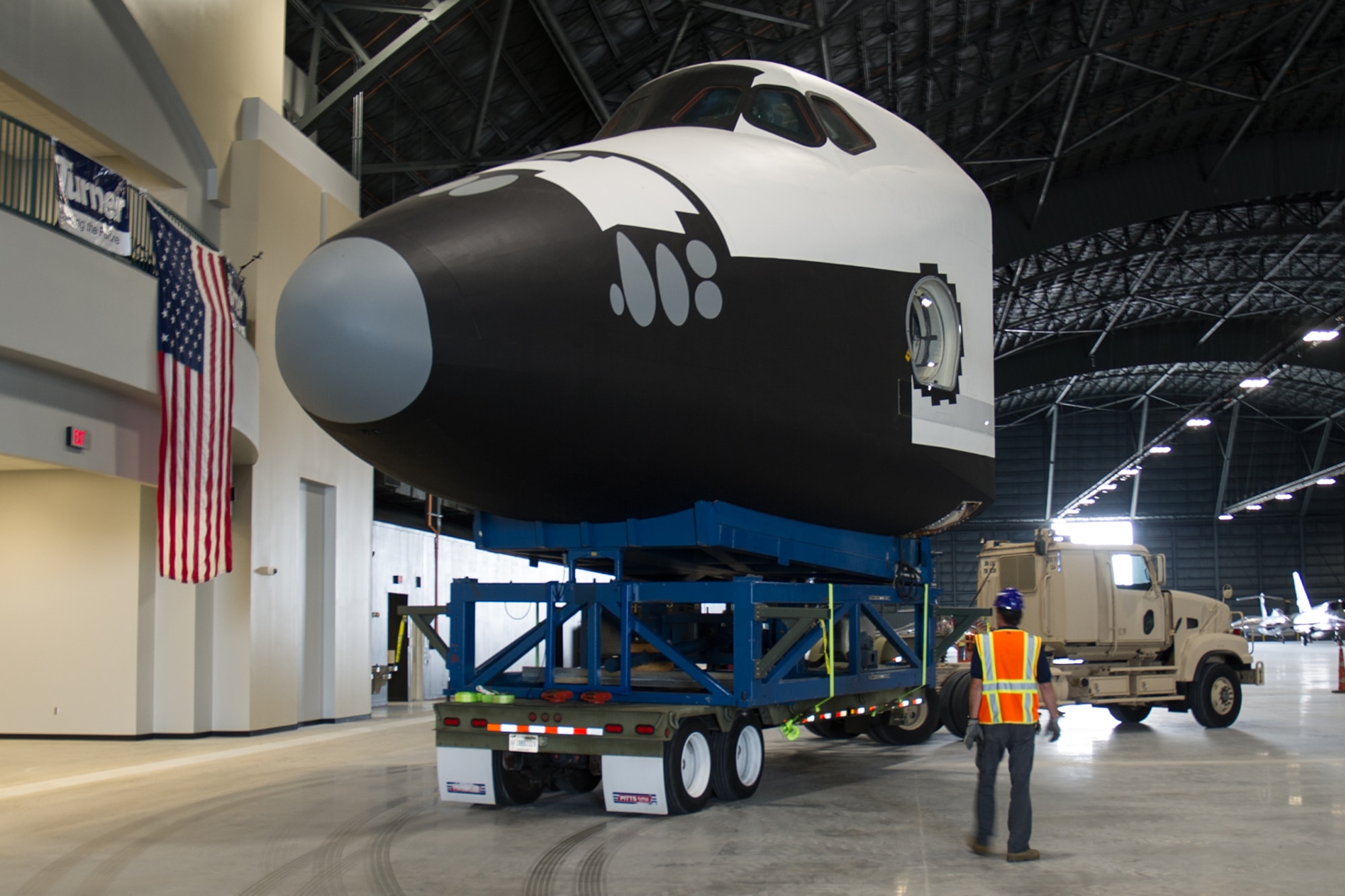 DAYTON, Ohio -- Restoration staff move the Space Shuttle Exhibit(CCT) into the new fourth building at the National Museum of the U.S. Air Force on Oct. 22, 2015. (U.S. Air Force photo)
