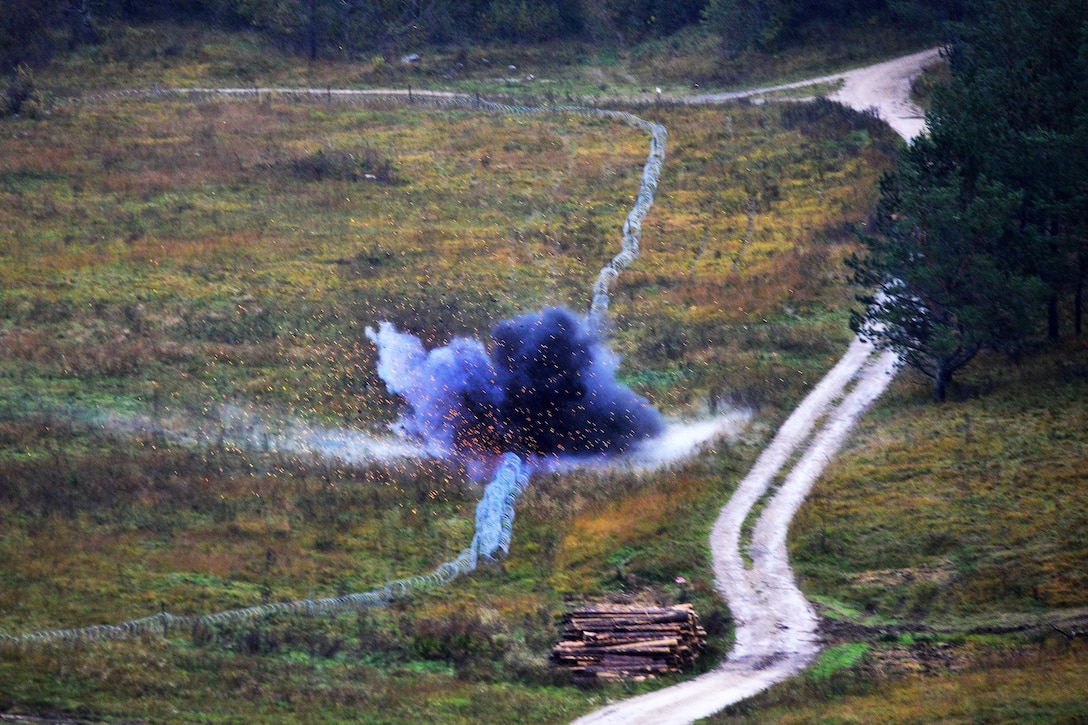 U.S. paratroopers detonate an explosive charge to open a breach during live-fire traiing as part of Rock Proof V at Pocek Range in Postojna, Slovenia, Oct. 19, 2015. U.S. Army photo by Paolo Bovo
