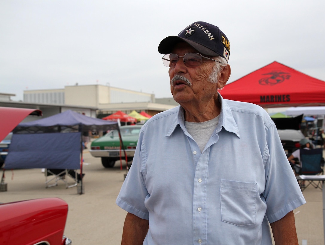 Joaquin "Jack" Ledesma, Korean War veteran, at the 14th Annual Wings, Wheels, Rotors and Expo at Joint Forces Training Base Los Alamitos, Calif., Oct. 25, 2015. Ledesma, served in the U.S. Army, as a private first class with the 2nd Infantry Division, 2nd Battalion 15th Field Artillery Regiment in 1953. Recently, Ledesma traveled back to Korea with some of his former fellow Soldiers. "It was the experience of a lifetime, we traveled to the DMZ and watched the Republic of Korea Soldiers do a Tae Kwon Do demonstration." said Ledesma. The Wings, Wheels and Rotors Expo, produced by the Los Alamitos Area Chamber of Commerce, features hundreds of hot rods and exotic cars, helicopters, airplanes and vintage warplanes on display combined with local vendors, great food and exhibits from law enforcement agencies and the military.