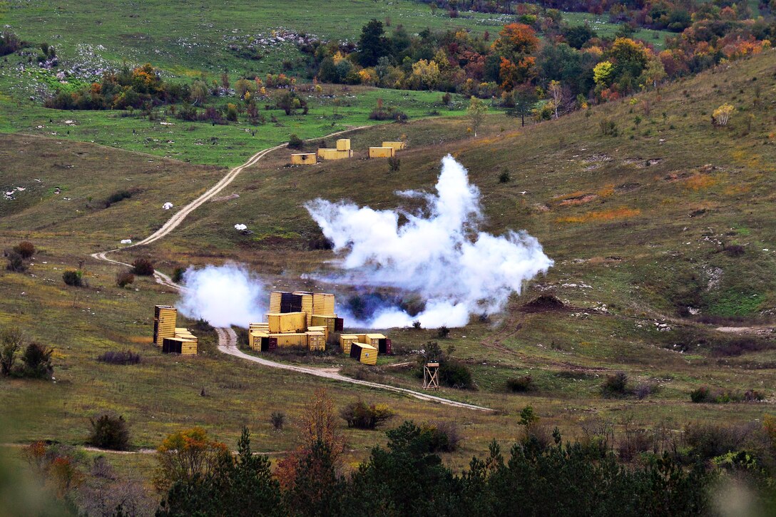 Rounds fired from a Slovenian air force Pilatus PC-9 aircraft, not pictured, hit targets called in by U.S. soldiers during Rock Proof V at Pocek Range in Postojna, Slovenia, Oct. 19, 2015. U.S. Army photo by Paolo Bovo