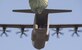 A container delivery system airdrops from a C-130J Super Hercules assigned to the 37th Airlift Squadron Oct. 27, 2015, at Powdiz Air Base, Poland. The drop was performed during Aviation Detachment 16-1, a flying training deployment that helps crews maintain their readiness and interoperability with NATO allies. (U.S. Air Force photo/Senior Airman Damon Kasberg)