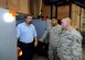 Rick Hammock, the 97th Maintenance Squadron aerospace ground equipment work leader, examines a mobile power generator for the KC-46A Pegasus with Staff Sgt. Detreck Ortiz (middle), a 22nd MXS aerospace ground equipment journeyman, and Staff Sgt. Allan Shurtz, a 931st MXS aerospace ground equipment journeyman, Oct. 27, 2015, at McConnell Air Force Base, Kan. Personnel from the three maintenance squadrons are working with the 22nd Logistics Readiness Squadron as maintenance equipment is shipped to McConnell in preparation of the arrival of the KC-46. (U.S. Air Force photo/Senior Airman Victor J. Caputo)