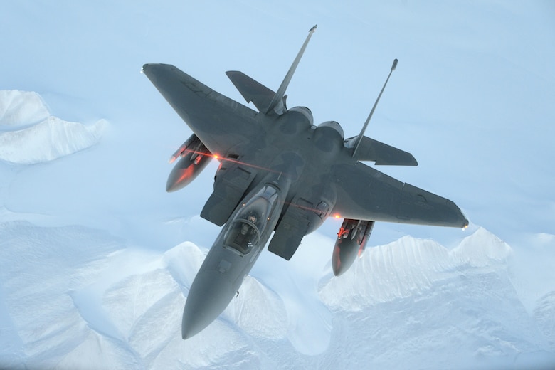 An F-15C Eagle from the 144th Fighter Wing flies above the High Arctic Oct. 22, 2015. From Oct. 15-26, 2015, approximately 700 members from the Canadian Armed Forces and the U.S. Air Force, Navy, and Air National Guard deployed to Iqaluit, Nunavut, and 5 Wing Goose Bay, Newfoundland and Labrador, for Exercise Vigilant Shield 16. (U.S. Air National Guard photo/Master Sgt. David J. Loeffler)