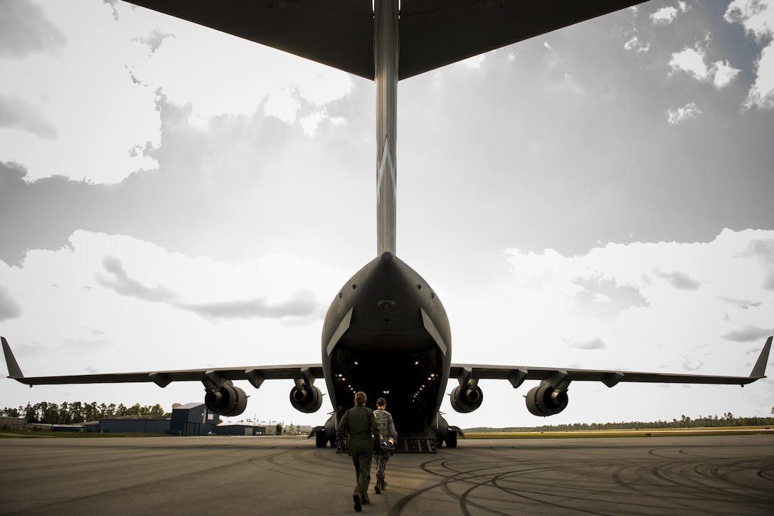 Aeromedical evacuation members load a patient onto a West Virginia Air National Guard C-17 Globemaster III during Exercise Southern Strike 16 at Stennis International Airport in Hancock County, Miss., Oct. 28, 2015.  The Air National Guard's Combat Readiness Training Center hosts the multiservice training exercise, which runs through Nov. 6, 2015. U.S. Air Force photo by Staff Sgt. Jamal D. Sutter