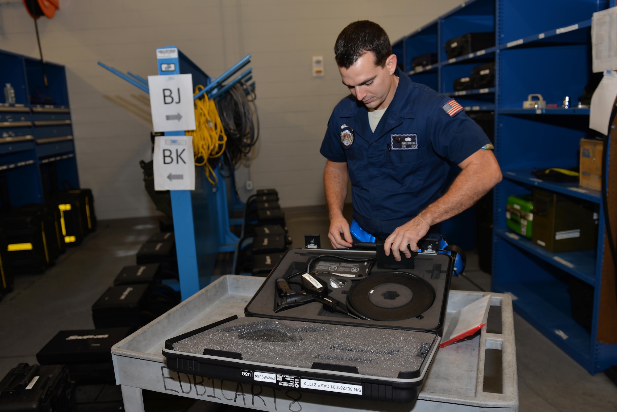 Staff Sgt. Danny Pereira, 33rd Aircrafts Maintenance Squadron crew chief, inspects equipment to take out to the flightline at Eglin Air Force Base, Fla., Oct. 28, 2015.  Crew chiefs come to supply to check out all equipment used to maintain the F-35A Lightning II. (U.S. Air Force Photo/Senior Airman Andrea Posey)