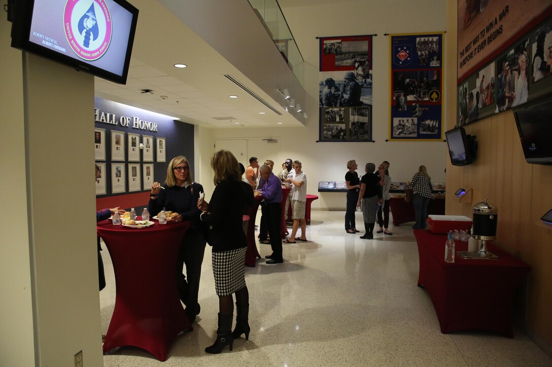 Marines Raiders and their families shared a meal before suicide awareness training at Marine Corps Forces, Special Operations Command at Stone Bay aboard Marine Corps Base Camp Lejeune, N.C., Oct. 22, 2015.