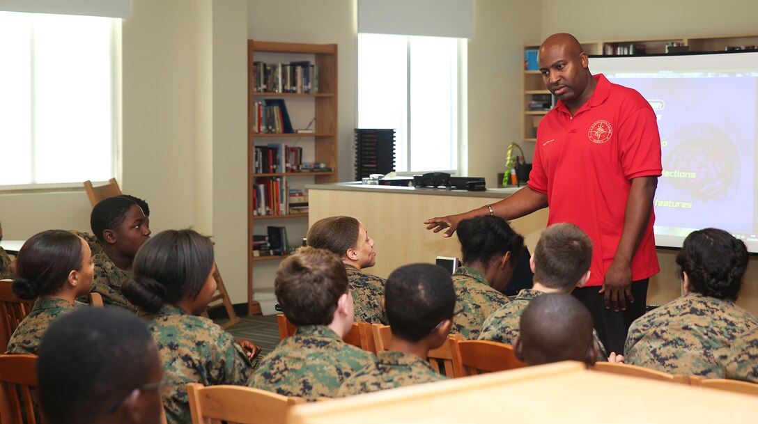 NEW ORLEANS – Sensei Jason B. Horne, Master Instructor of XS Martial Arts Dojo, speaks with students at the New Orleans Military and Maritime Academy Oct. 29, 2015, during Red Ribbon Week. Horne guided the students on the potential dangers they could face if using illegal or prescription drugs in regards to their futures, how one missed step could prevent them from achieving their dreams. (Marine Corps Photo by Cpl. J. Gage Karwick/Released)