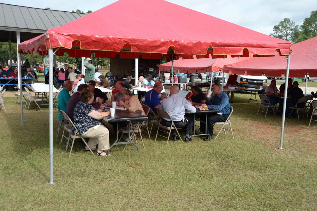 Marine Corps Systems Command personnel aboard Marine Corps Logistics Base Albany take a break from traditional work assignments and office tasks to celebrate their “hard work and accomplishments” here, Oct. 28. The activity was one of several of an “Octoberfest” held at Boyett Park and Covella Pond during the day’s events.