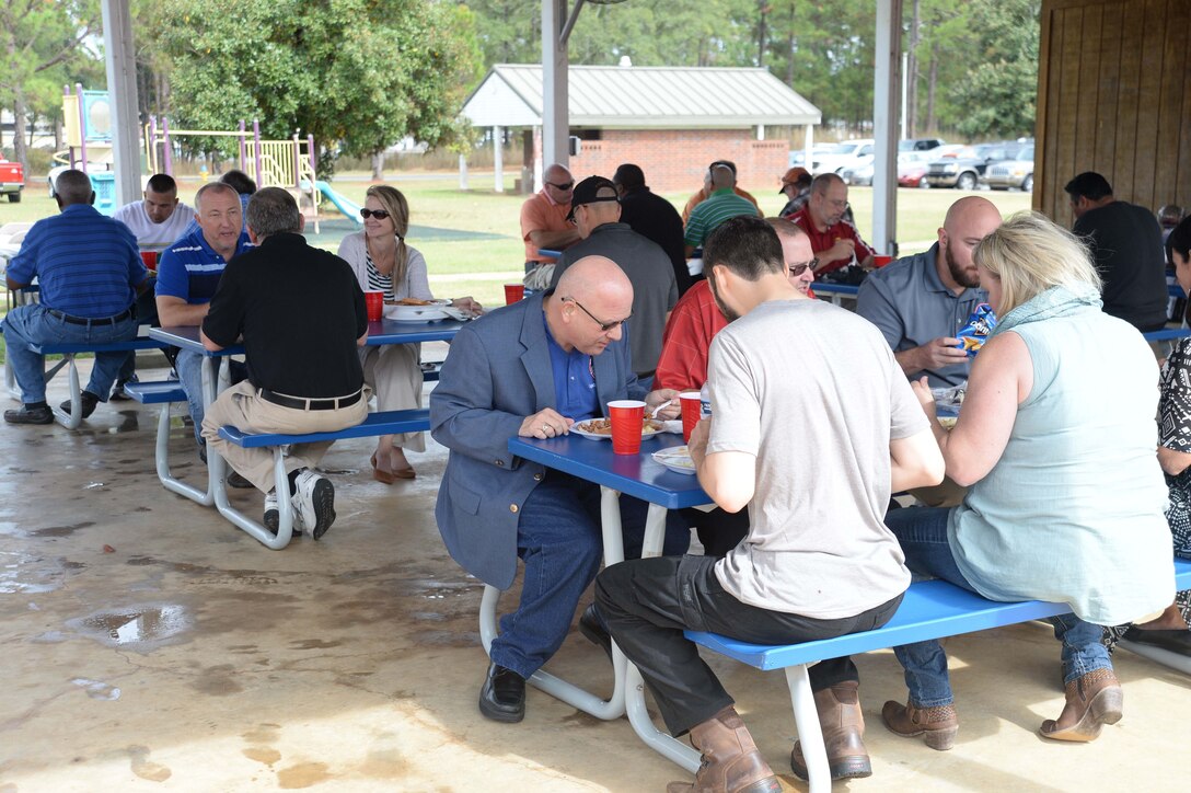 Marine Corps Systems Command personnel aboard Marine Corps Logistics Base Albany take a break from traditional work assignments and office tasks to celebrate their “hard work and accomplishments” here, Oct. 28. The activity was one of several of an “Octoberfest” held at Boyett Park and Covella Pond during the day’s events.
