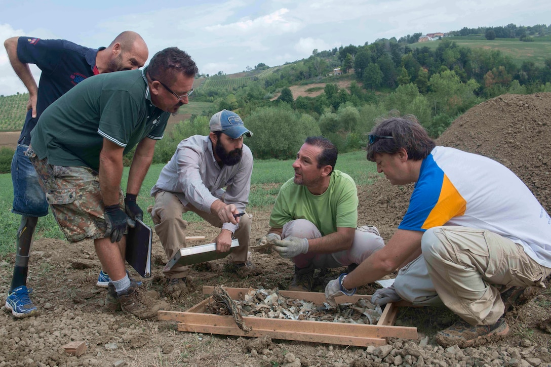 Personnel assigned to and working with the Defense POW/MIA Accounting Command conduct recovery operations as part of a DPAA mission in Rimini, Italy, Aug. 18, 2015. DPAA's mission is to provide the fullest possible accounting for our missing personnel to their families and the nation. (U.S. Navy photo by MC1 Vladimir Potapenko/Released)