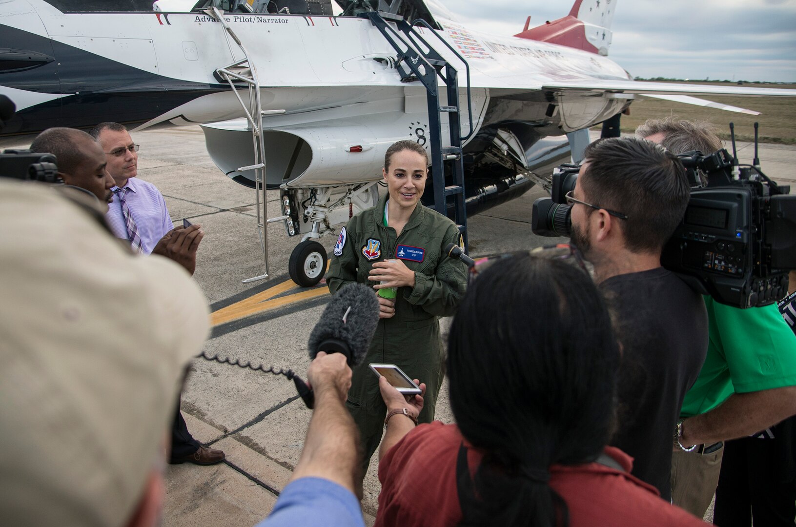 Spurs Assistant Coach Becky Hammon speaks to San Antonio reporters following her media flight with the USAF Thunderbirds from Joint Base San Antonio-Randolph Oct. 29.  The Thunderbirds are headlining the JBSA Air Show and Open House and will perform Oct. 31 and Nov. 1.