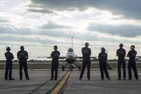 Members of the Thunderbirds ground crew wait to launch Maj. Scott Petz, Thunderbird #8, and Becky Hammon, San Antonio Spurs assistant coach, Oct. 29, 2015, at Joint Base San Antonio-Randolph. The Thunderbirds will be performing at the JBSA Air Show and Open House Oct. 31 and Nov. 1 at 3 p.m. Opening ceremonies are at 11 a.m. both days.  Go to www.jbsa.mil for more information on the two-day event that is free and open to the public.