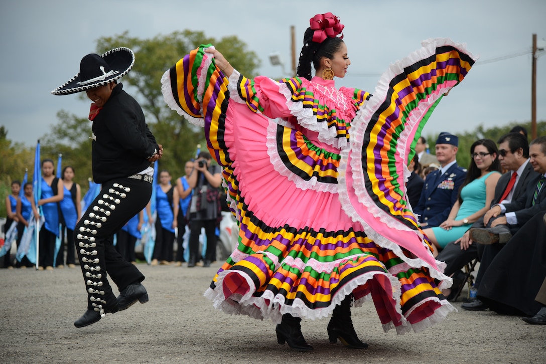 Dancers with the folkloric dance group of Ciudad Acuña entertain attendees at Brown Plaza in Del Rio, Texas on Oct. 23, 2015. The polkas, redovas, mazurkas, schottische, the waltz, and the corrido are still big favorites in Northern Mexico and Southern U.S. one hundred years after their introduction into Mexico. (U.S. Air Force photo by Tech. Sgt. Steven R. Doty)(Released)