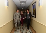 Brig. Gen. Scott Pleus, 56th Fighter Wing commander, Jennifer Pleus, and Jane Yates, 56th FSS lodging manager, tour the lodging facility October 29, 2015, at Luke Air Force Base, Arizona. The new facilities will allow for families with or without pets to stay in lodging. (U.S. Air Force photo by Staff Sgt. Marcy Copeland)     