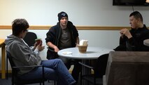 Debbie Ellgen, Higher Grounds Airmen Ministry Center co-director speaks with Airmen after dinner Oct. 28, 2015, in the center located in Bldg. 248 on F.E. Warren Air Force Base, Wyo. Ellgen cooks dinners for Airmen three times a week to help foster a family-like community in the center. (U.S. Air Force photo by Senior Airman Brandon Valle)