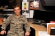 Airman 1st Class Levi Jackson, 319th Comptroller Squadron financial services technician, poses for a photo at his workspace on Grand Forks Air Force Base, North Dakota, Oct. 29, 2015. Jackson was named Warrior of the Week for the fifth week in October. (U.S. Air Force photo by Airman 1st Class Bonnie Grantham/released)