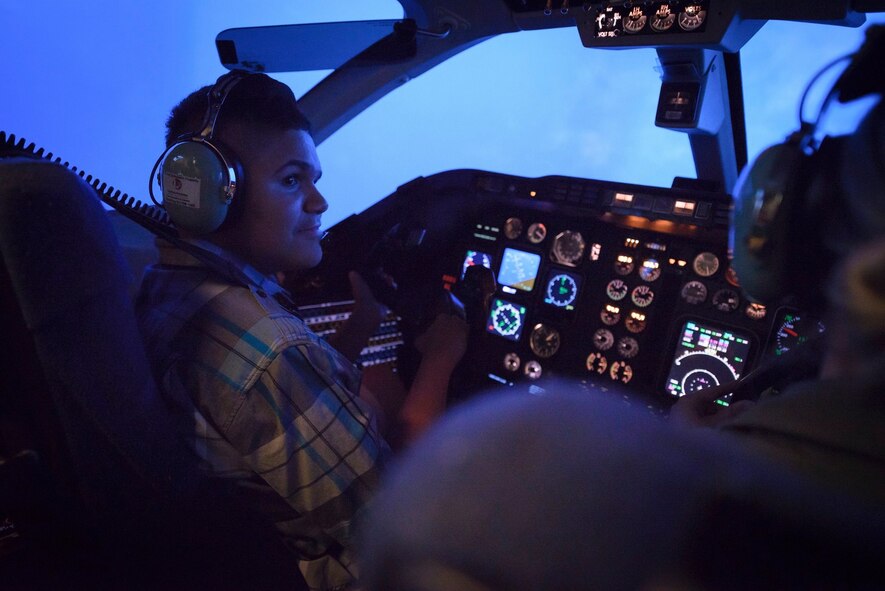 Damon Journey at the controls of a T-1 simulator at Vance Air Force Base, Oklahoma, Oct. 15. The teenage flight fan was a special guest of the 8th Flying Training Squadron and Team Vance. (U.S. Air Force photo/ David Poe)
