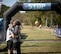 Tech. Sgt. Denarius Brittain (right) and her husband, Master Sgt. Torry Brittain, celebrate together at the finish line of the Pumpkin Holler Hunnerd, an ultramarathon at Tahlequah, Oklahoma, Oct. 18. The pair broke personal running records this weekend with Denarius finishing her first 50K and Torry completing an arduous 100-mile, 29-hour endurance test. (U.S. Air Force photo/ David Poe)