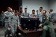 Students from the Airman Leadership Class  15-7 watch as a fellow student tries the F-35 Lightning II computer simulator during their tour of the Academic Training Center at Luke Air Force Base, Ariz., Oct. 28, 2015. The ALS class spent the day touring various sections of the 62nd FS as part of the ALS Sponsorship program. (U.S. Air Force photo by Senior Airman Devante Williams)