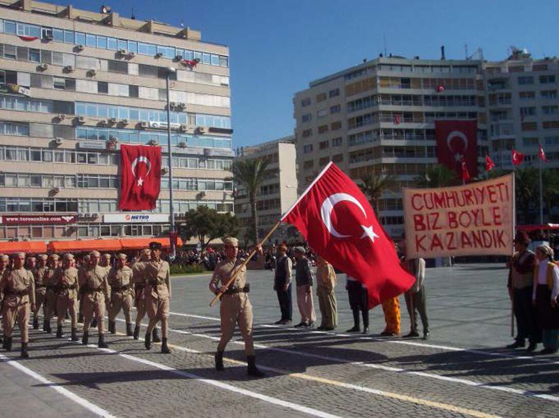 Turkish forces and local students reenact the proclamation of the Republic of Türkiye on Oct. 29, 1923, during a Republic Day celebration at the Republic Square in Izmir.  (U.S. Air Force photo by Tanju Varlikli)
