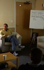 Brad Ellgen, Higher Grounds Airmen Ministry Center Co-director, provides mentoring on character to Airmen Oct. 28, 2015, in the center located in Bldg. 248, on F.E. Warren Air Force Base, Wyo. Ellgen leads the sessions once a week for Airmen. (U.S. Air Force photo by Senior Airman Brandon Valle)