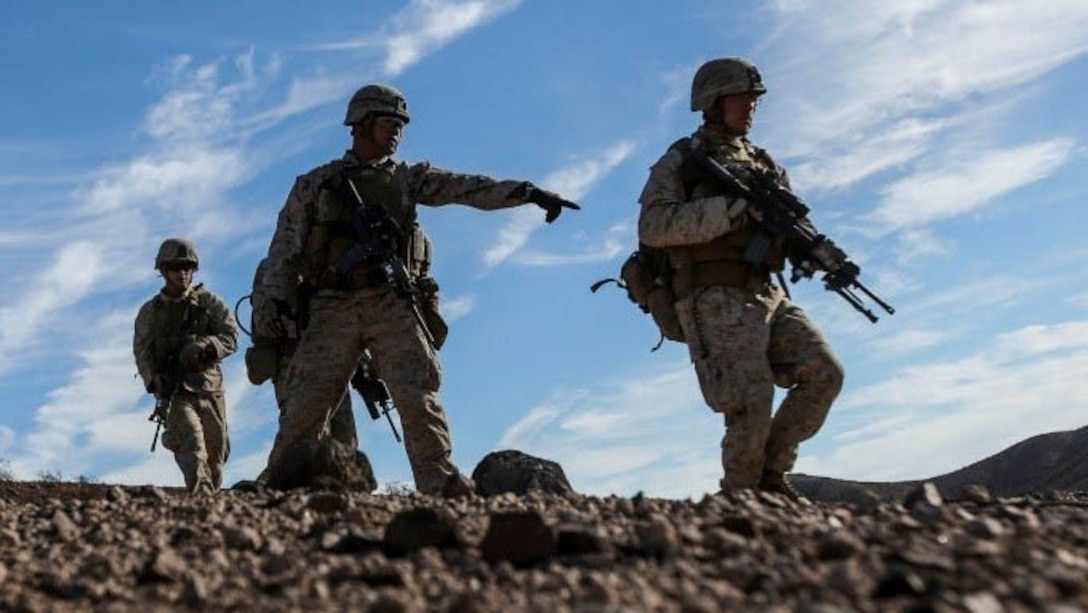 Marines with Alpha Company, 1st Battalion, 8th Marine Regiment advance to establish an offensive position during Integrated Training Exercise 1-16 aboard Marine Air Ground Combat Center, Twentynine Palms, Calif., Oct. 26, 2015. During ITX, Marines demonstrate core infantry mission essential tasks while conducting offensive and defensive stability operations.