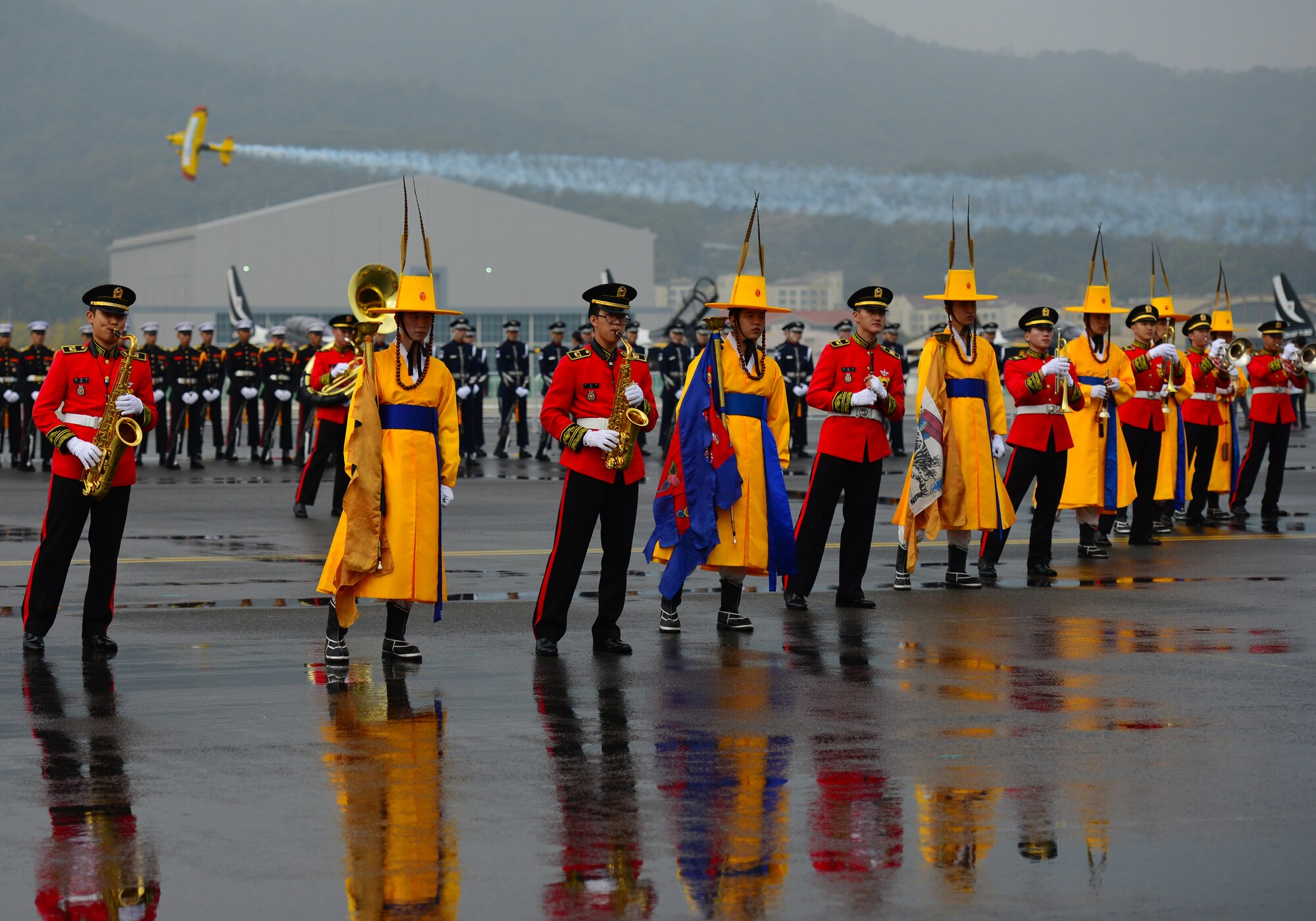 The 2015 Seoul International Aerospace and Defense Exhibition opened to the public with a colorful display of cultural history combined with regimented military drill at the Seoul Airport, Republic of Korea, Oct. 24th, 2015. Combining the past and the present in an intricate dance of tradition and strength, the people of the Republic of Korea showcased their honored legacies to the delight of the gathered crowds. 
(U.S. Air Force photo/Staff Sgt. Amber Grimm)