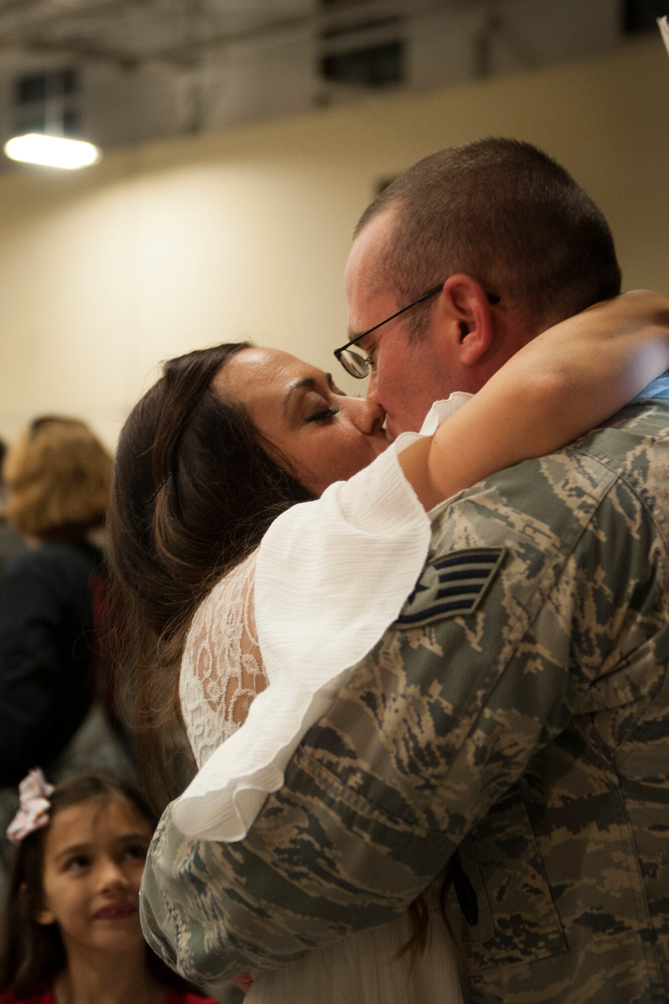 U.S. Air Force Staff Sgt. Joshua Hurley, 823d Base Defense Squadron fire team leader, and his wife, Alisha, share a moment during a re-deployment ceremony, Oct. 27, 2015, at Moody Air Force Base, Ga. The 823d BDS is one of four squadrons in the 820th Base Defense Group which provides fully-integrated, highly capable and responsive forces to protect Expeditionary Air Forces at a moment’s notice. (U.S. Air Force photo by Airman 1st Class Kathleen D. Bryant/Released)
