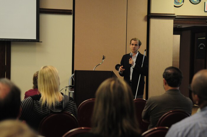 Justin Harford, a disability community advocate at FREED center for independent living, speaks to the audience during a National Disability Employment Awareness Month event Oct. 28, 2015, at Beale Air Force Base, California. The event marks the 70th year since the first observance of NDEAM, which is themed My Disability is One Part of Who I am. (U.S. Air Force photo by Staff Sgt. Zachary L. Vucic)