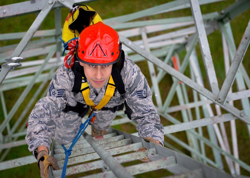 Staff Sgt. Ivan Guerrero, 1st Communications Maintenance Squadron cable and antenna systems technician, climbs a telephone tower Oct. 9, 2015, at Ramstein Air Base, Germany. The 1st CMXS Airmen attended Specialized Technical Aided Rescue Training, which encompasses multiple ways to rescue a telephone tower fall victim. (U.S. Air Force photo/Senior Airman Nicole Sikorski)