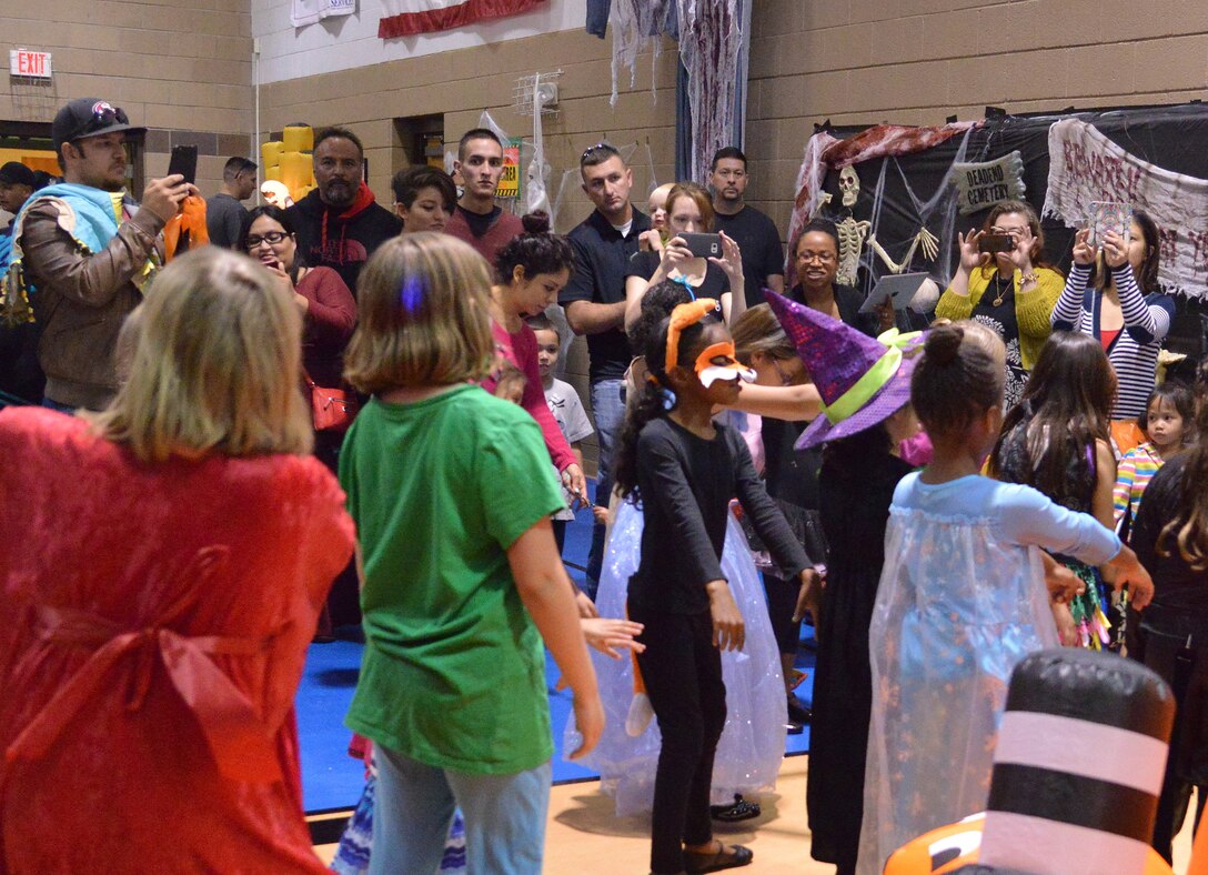 Adults and kids alike enjoyed the Youth Center's annual Halloween event Bootastic Oct. 23. The event provided a free night of games, prizes, safe trick-or-treating and other fun activities. (Photo by Jamie Burnett)