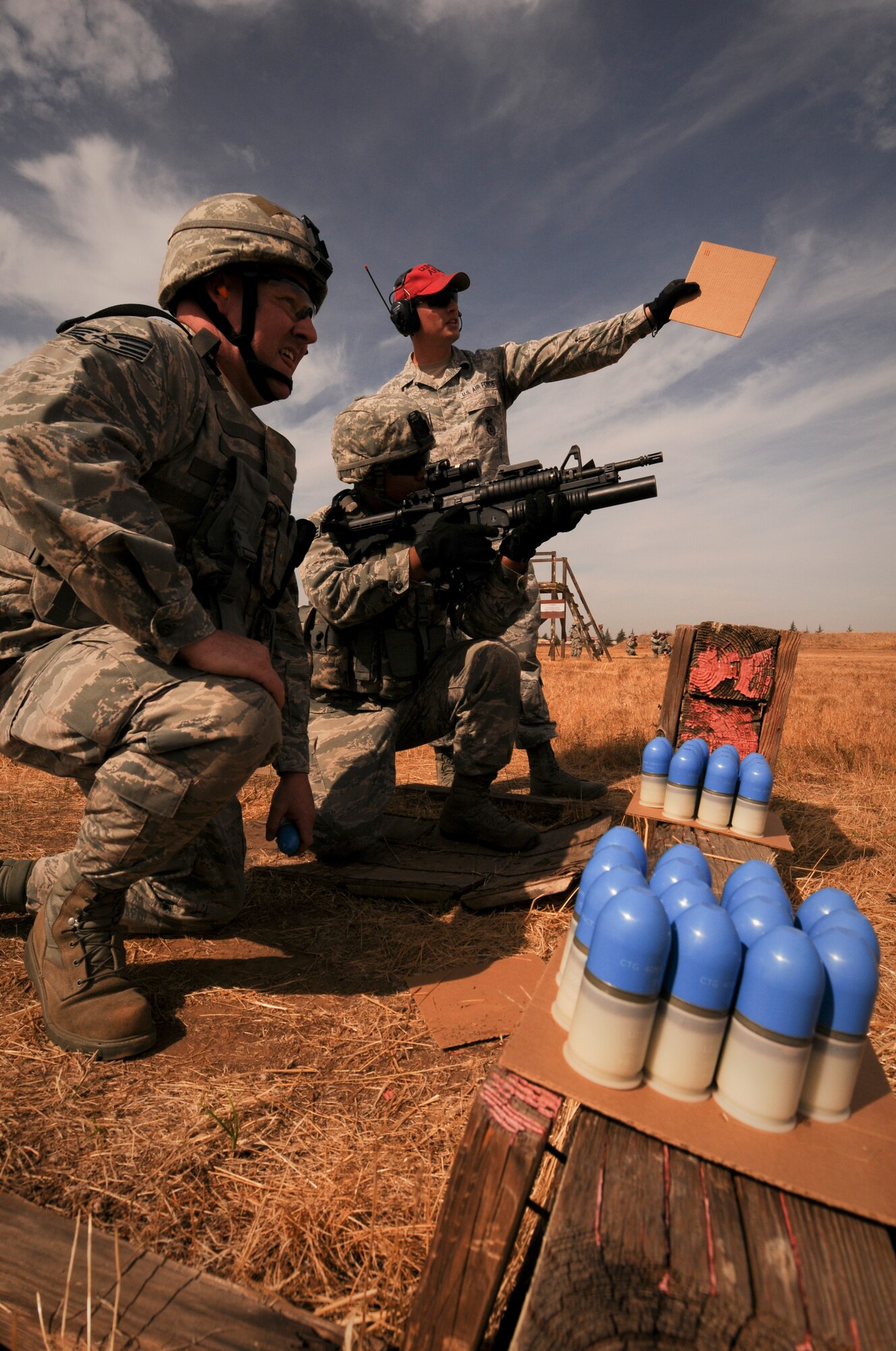 U.S.  Airmen from the 129th Rescue Wing zero their M203 grenade launchers, Beale Air Force Base, Calif., Oct. 8, 2015. Security forces is preparing for deployment later this year. (U.S. Air National Guard photo by Kim E. Ramirez/Released)