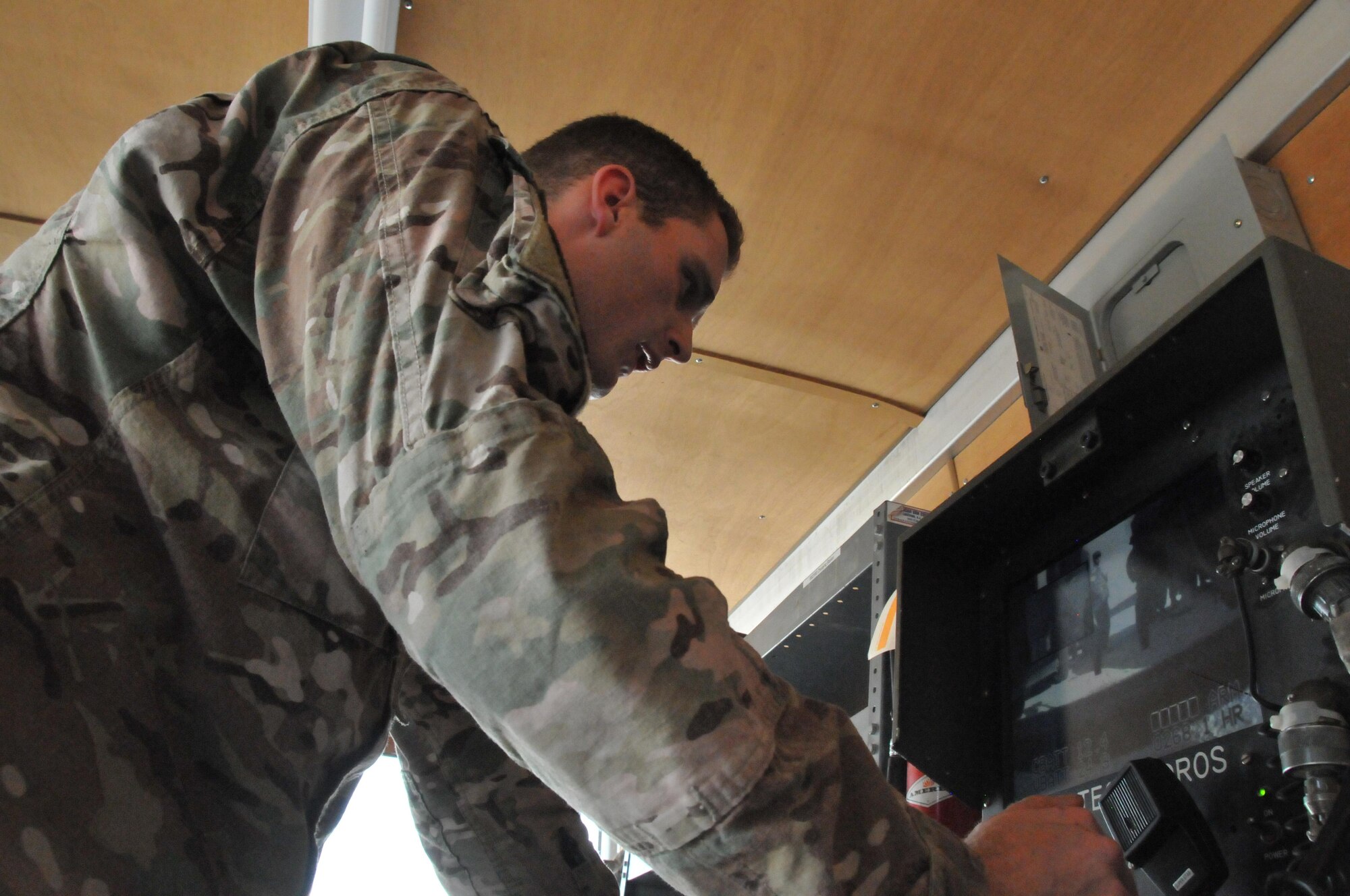 Senior Airman Joel Miller, 379th Expeditionary Civil Engineer Squadron explosive ordnance technician, guided the F6 robot into a building during an interagency training exercise Oct. 27 at Al Udeid Air Base, Qatar. Miller guided the robot inside a building to locate mock explosive devices during the exercise. (U.S. Air Force by Tech. Sgt. Terrica Y. Jones/Released)
