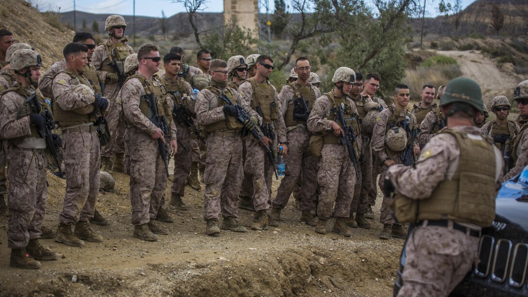 Marines with 4th Light Armored Reconnaissance Battalion, 4th Marine Division stand by during a safety brief before they conduct live fire drills during exercise Trident Juncture 2015 in Almeria, Spain, Oct. 27, 2015. Live fire drills allow Reserve Marines to train in realistic environments and maintain a high state of readiness. More than 36,000 troops from more than 30 nations are participating in the exercise which is the largest NATO has conducted in the past 10 years. 
