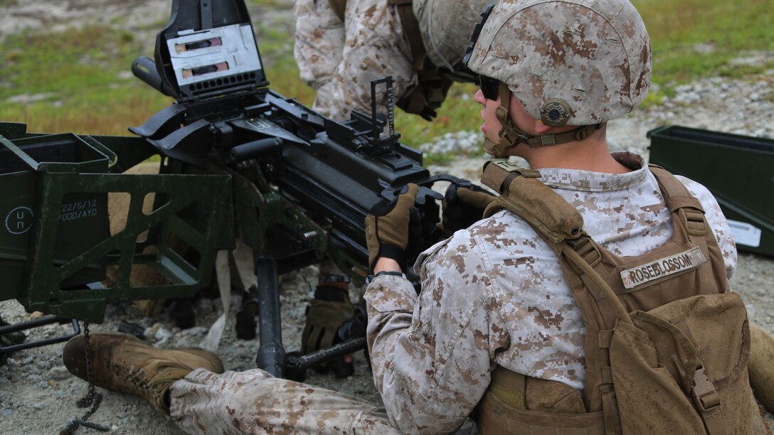Cpl. Christopher Roseblossom operates a MK-19 during an M67 fragmentation grenade and MK-19 Grenade Launcher range at Marine Corps Base Camp Lejeune, N.C., Oct. 28, 2015. More than 70 Marines with 2nd Low Altitude Air Defense Battalion took turns handling the MK19 and handheld grenades during the familiarization range. The range offered Marines the opportunity to build confidence and proficiency skills on some of the crew-served weapons they operate while providing security in a deployed environment. Roseblossom is a low altitude aerial defense gunner with the battalion. 