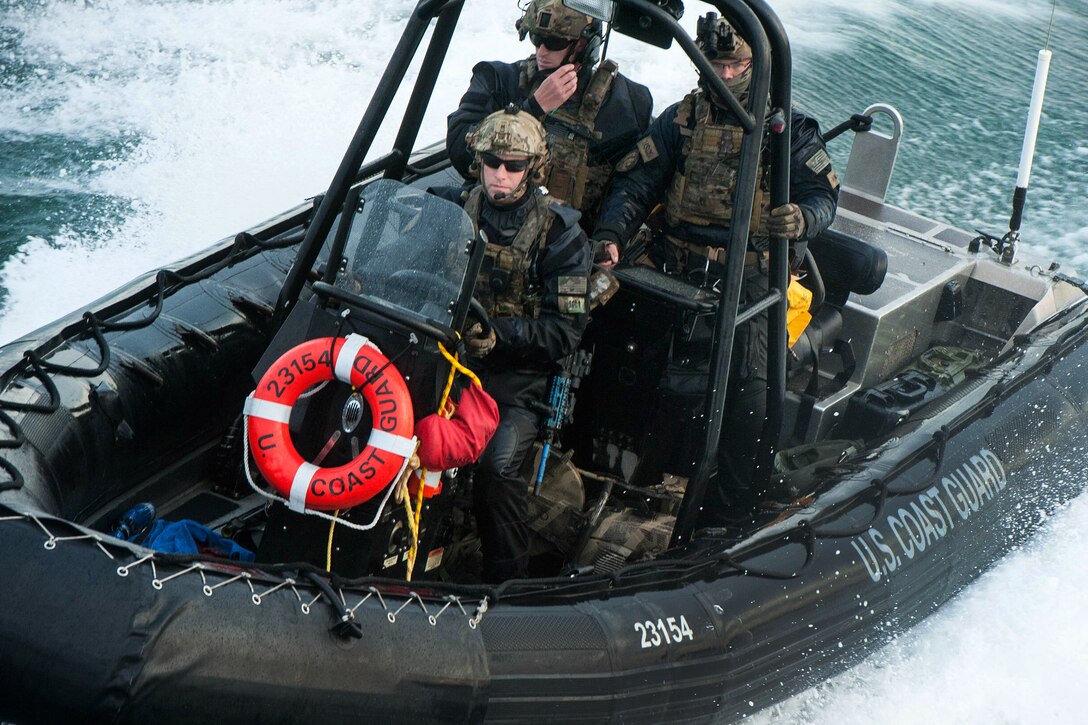 Coast Guardsmen ride in a rigid hull inflatable boat while training in Hyannis, Mass., Oct., 22, 2015. U.S. Coast Guard photo by Petty Officer 3rd Class Ross Ruddell
